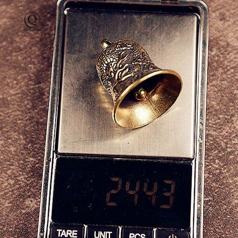 Vintage Brass Bell Carved Drag - огляд і ціна Vintage Collectible Bells